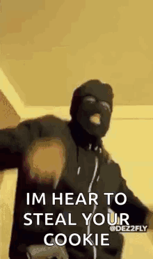Man In Ski Mask Holding Gun Im Hear To Steal Your Cookie GIF