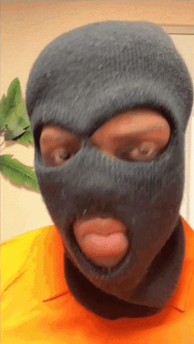 Man in Ski Mask Tongue Out