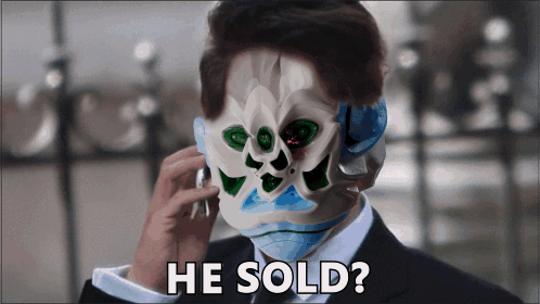 Man In Skull Mask Talking On Phone Saying He Sold GIF