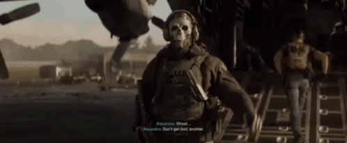 Man in Skull Mask Talking to Another Man