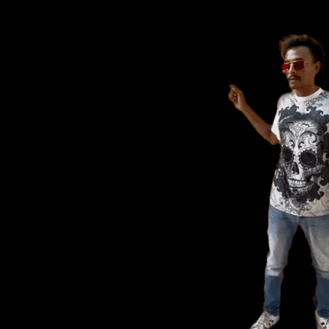 Man in Skull Shirt Pointing at Type