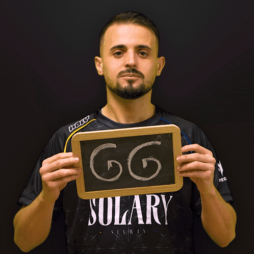 Man in Solary Shirt Holding Up Sign