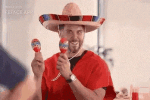 Man in Sombrero Holding Maracas