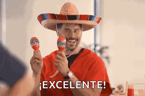 Man in Sombrero Holding Two Maracas