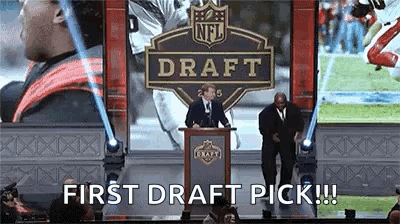 Man in Son of a Dad Sweatshirt Holding Corona Beer