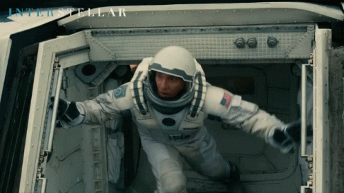 Man In Space Suit Jumping From Spaceship Interstellar GIF