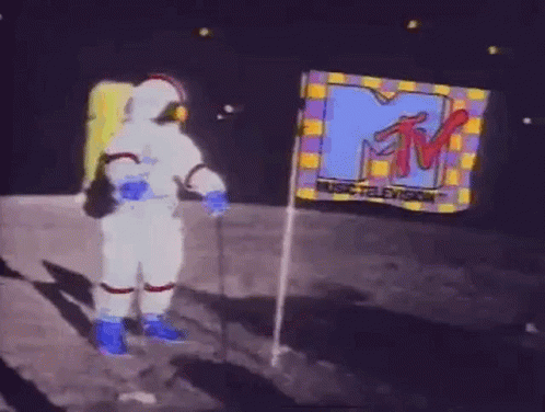 Man In Space Suit On Moon In Front Of MTV Logo GIF