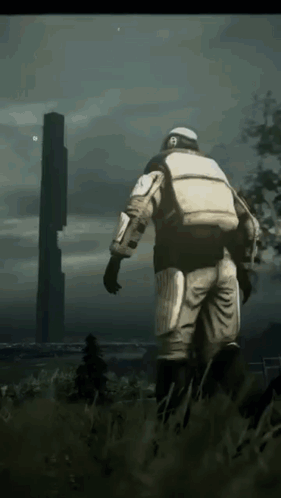 Man In Space Suit Walking Through Field With Tower GIF