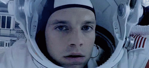 Man In Space Suit Wearing Helmet GIF