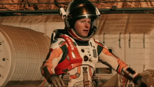 Man In Space Suit With Crew GIF