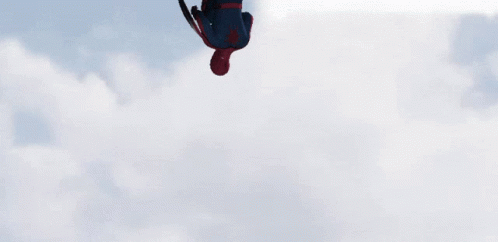 Man In Spider Man Costume Holding Captain America Shield GIF