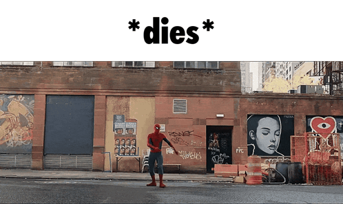 Man in Spider-Man Costume in Front of Building