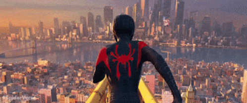 Man In Spiderman Costume In Front Of City Skyline GIF
