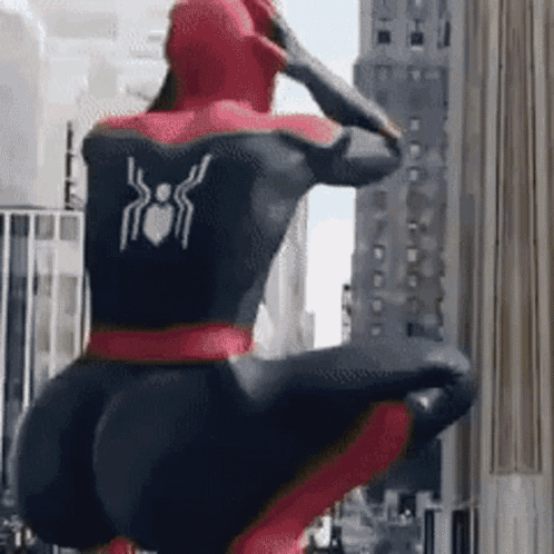 Man in Spiderman Costume Kneeling