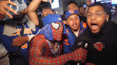 Man in Spiderman Costume Poses