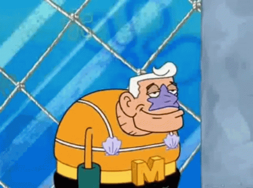 Man in Spongebob Squarepants Costume Standing Next to Wall