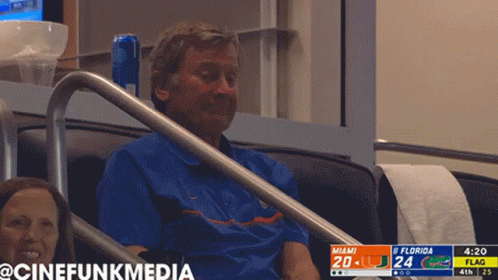 Man in Stadium Watching Florida vs Flag