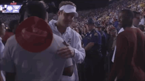 Man In Stadium With McDonald's Sign GIF
