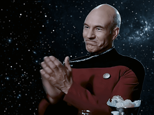 Man in Star Trek Uniform Clapping