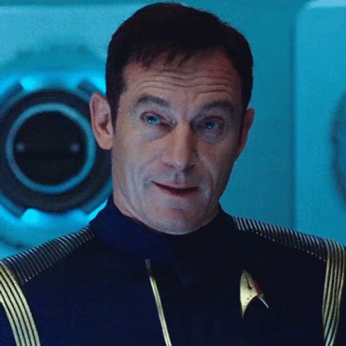 Man in Star Trek Uniform Looking at Camera