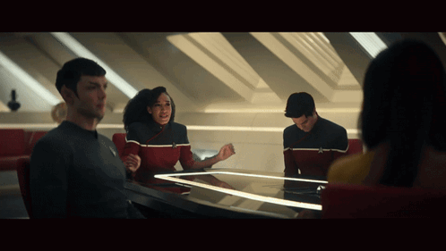 Man in Star Trek Uniform Wearing Futuristic Glasses