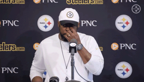 Man in Steelers Hat Covering Face