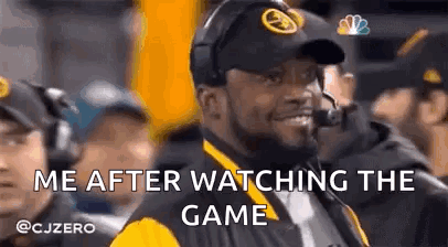 Man in Steelers Hat Covering Face With Hand