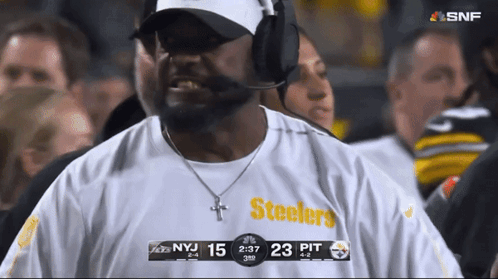Man in Steelers Shirt Standing in Crowd