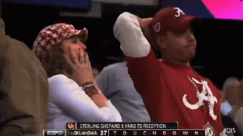 Man in Sterling Shepard 3 Yard to Reception Shirt Watching Game