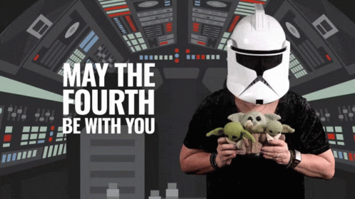 Man in Stormtrooper Helmet Holding Stuffed Animals