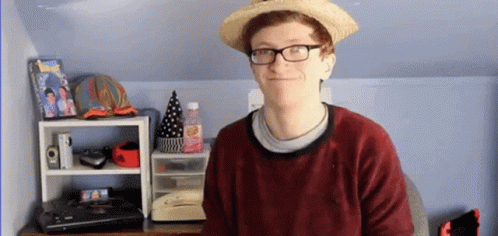 Man in Straw Hat and Glasses