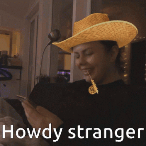Man in Straw Hat Saying Howdy Stranger