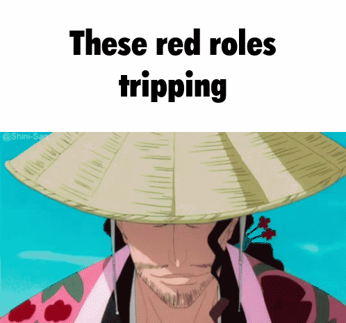Man in Straw Hat Saying These Red Roles Tripping