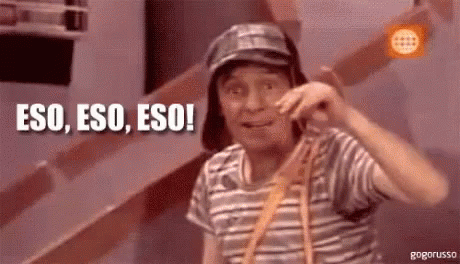 Man in Striped Shirt and Hat Saying Eso Eso Eso