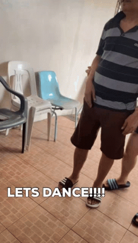 Man in Striped Shirt and Shorts Let's Dance