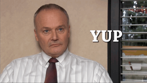 Man in Striped Shirt and Tie Saying Yup