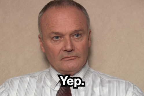 Man in Striped Shirt and Tie with Yep on Face