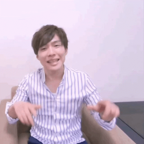 Man in Striped Shirt Hands Outstretched