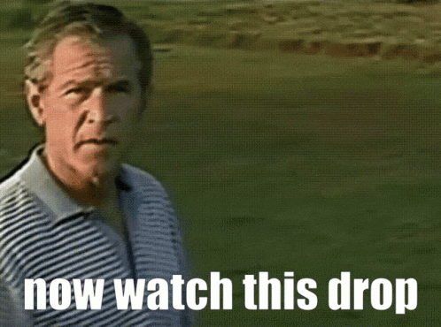 Man in Striped Shirt Holding Golf Club Saying Now Watch This Drop