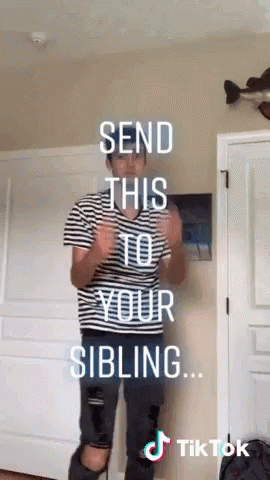 Man in Striped Shirt in Front of Send This to Your Sibling Door