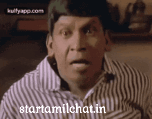 Man In Striped Shirt Making Funny Face GIF