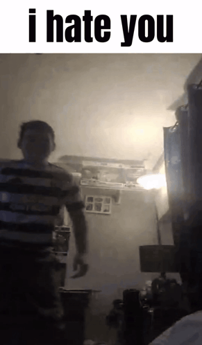 Man in Striped Shirt Saying I Hate You