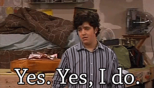 Man in Striped Shirt Saying Yes
