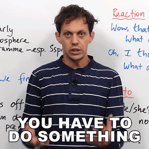 Man in Striped Shirt Whiteboard You Have to Do Something