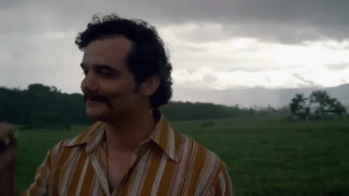 Man in Striped Shirt with Mustache