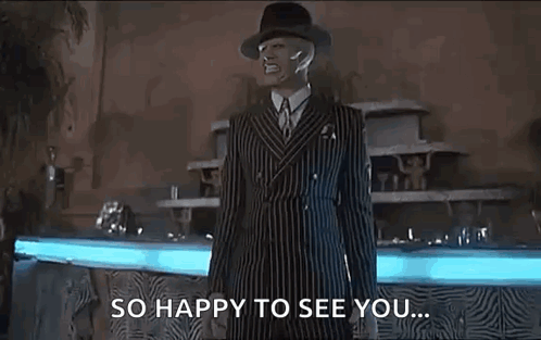 Man in Striped Suit and Hat by Fountain