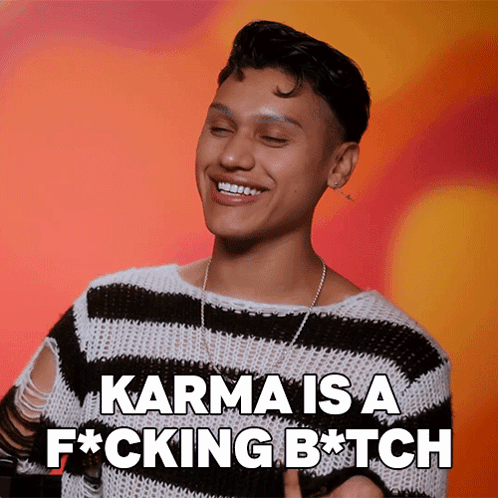Man In Striped Sweater Karma Is A Fucking Bitch GIF