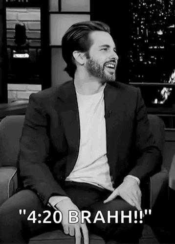 Man in Suit and Beard Laughing Black and White