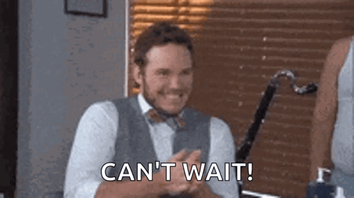 Man in Suit and Bow Tie Clapping
