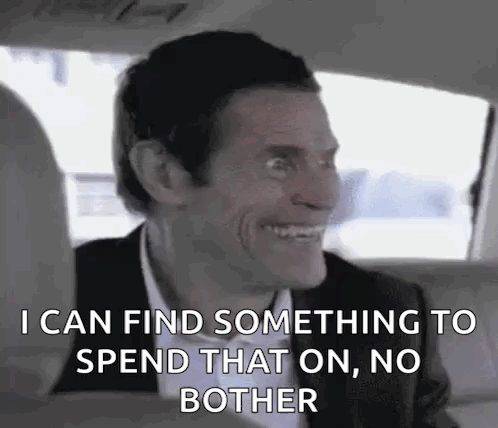 Man in Suit and Bow Tie in Back Seat